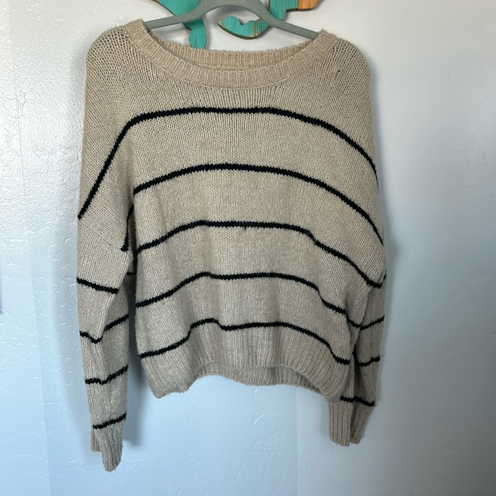 Lumiere tan sweater with black stripes